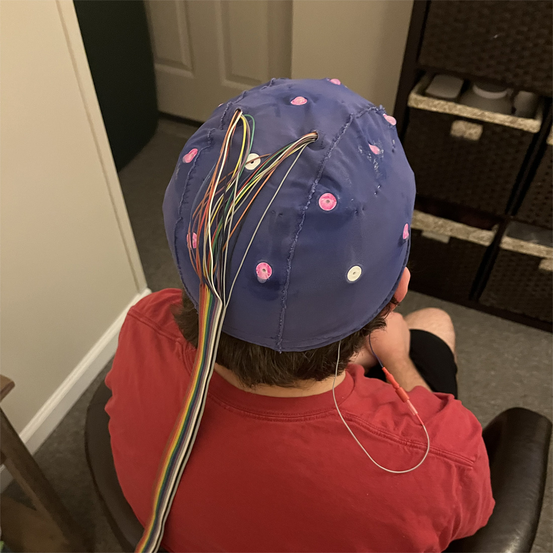 A boy is having his brainmap taken during an initial QEEG appointment at new Beginnings Wellness Center and BrainCore Clinic in Smithtown NY