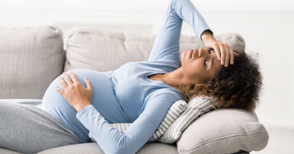 Pregnant woman experiencing anxiety and stress